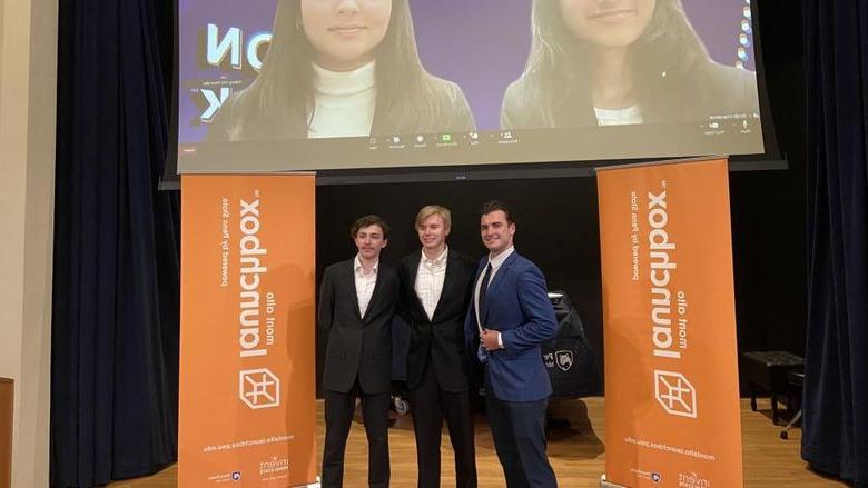 Winners of the 2023 LION Tank Pitch Competition stand and smile in front of Mont Alto Launchbox banners.